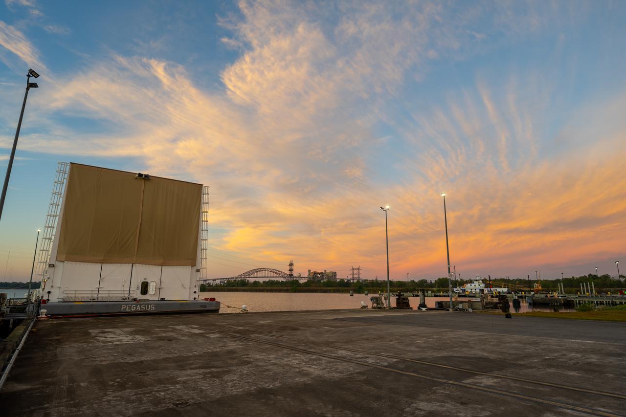 Teams at NASA’s Michoud Assembly Facility in New Orleans move the engine section flight hardware to the agency’s Pegasus barge Sunday, Dec. 4. The barge will ferry the engine section of NASA’s Space Launch System (SLS) rocket for Artemis III to the agency’s Kennedy Space Center in Florida. Once there, teams at Kennedy will finish outfitting the engine section, which comprises the tail-end of the rocket’s 212-foot-tall core stage, before integrating it to the rest of the stage. Beginning with production for Artemis III, NASA and core stage lead contractor Boeing will use Michoud, where the SLS core stages are currently manufactured, to produce and outfit the core stage’s five elements, and available space at Kennedy for final assembly and integration. Photo Credit: (NASA/Jared Lyons)